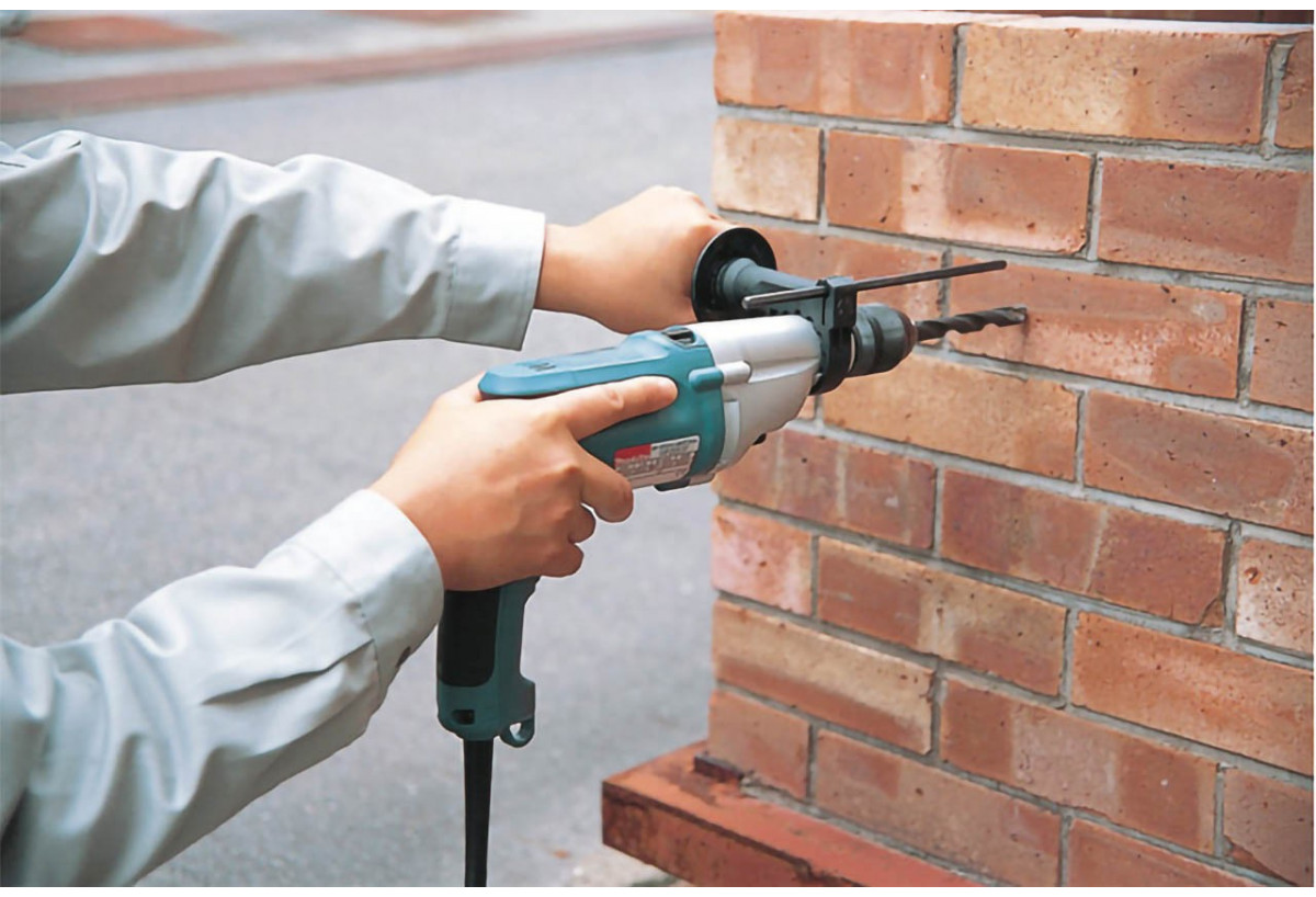 Perceuse à percussion 720 W diamètre 13 mm - Makita : Confort'Mat